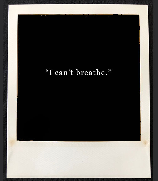 polaroid film blacked out with words "I can't breathe" in the center